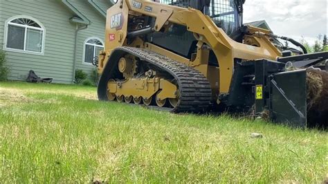 will a skid steer tear up my lawn|skid to minimize lawn wear.